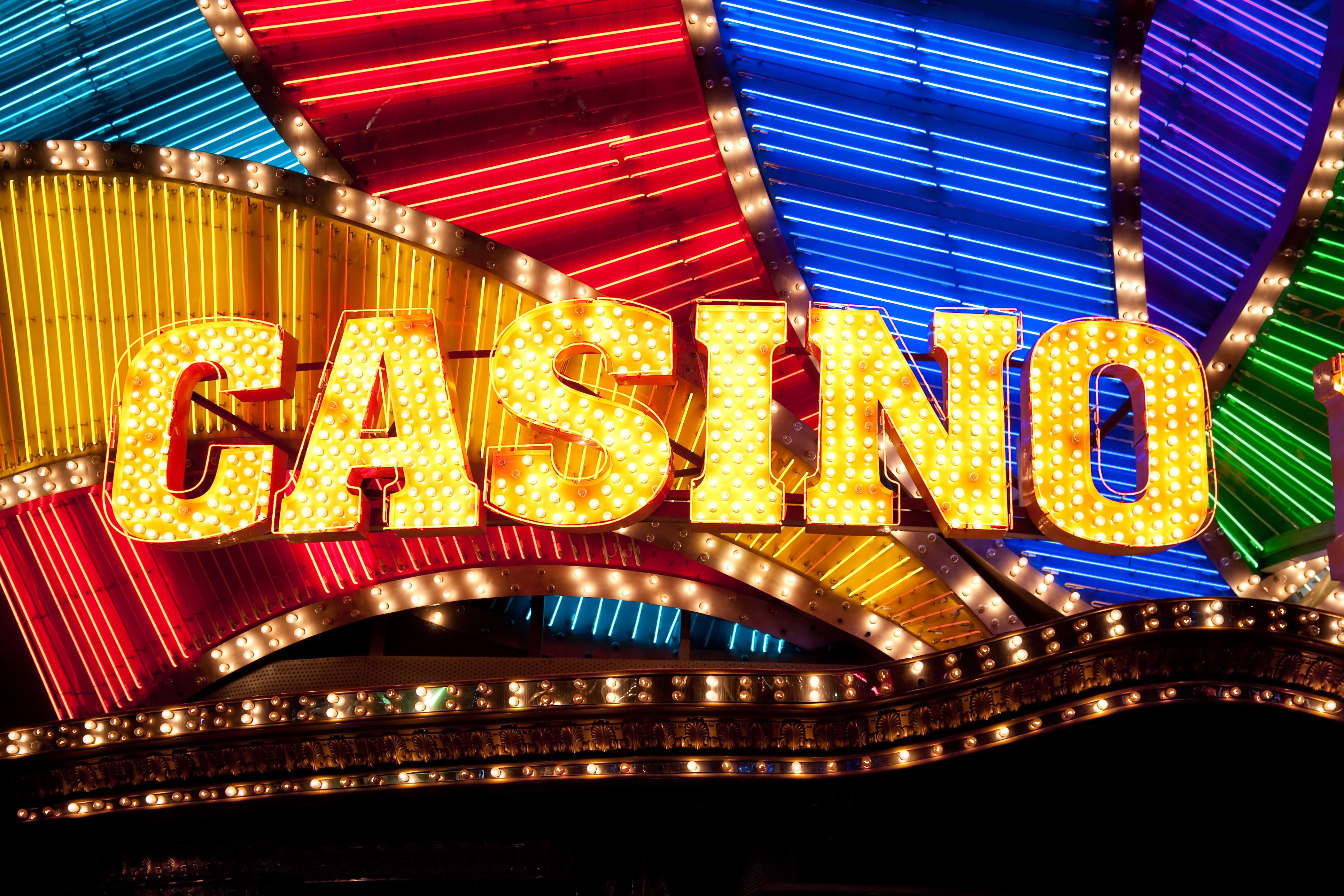 A vibrant graphic showcasing the iconic PokerStars red spade logo.